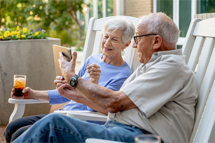 couple looking at tablet